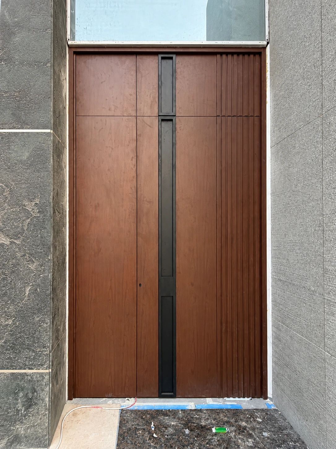 Wood-finish entrance &mdash; client project